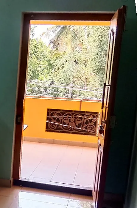 Balcony with coconut palm views at Uddish Residency, Chinna Veerampattinam