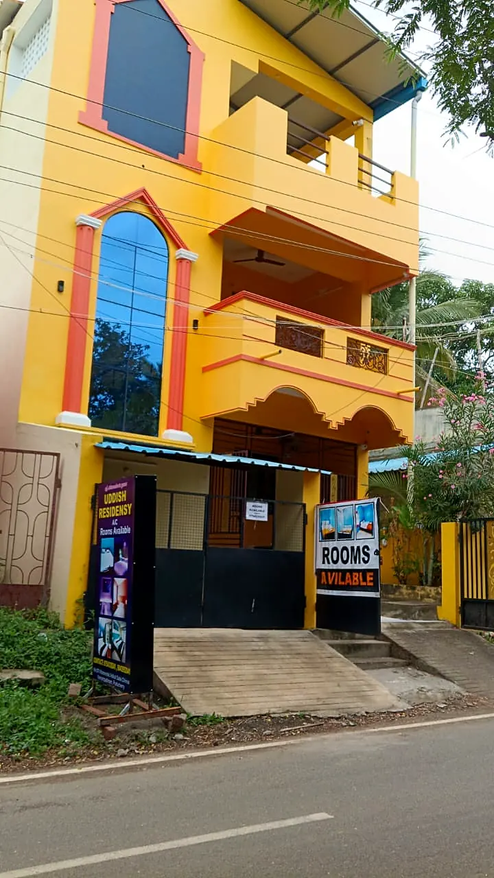 Street view of Uddish Residency on Maraimalai Adigal Salai near Eden Beach